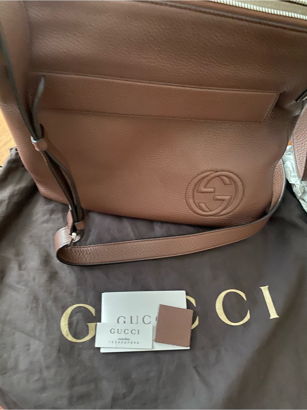 Gucci Brown Pebbled Leather Shoulder Bag with Embossed Logo Authentic